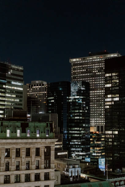 istock A beautifully illuminated nighttime cityscape featuring skyscrapers and lights 2183884598
