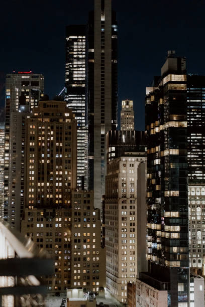 istock A beautifully illuminated nighttime cityscape featuring skyscrapers and lights 2183884672