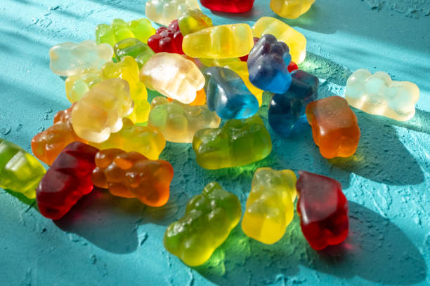 jelly beans bear shaped colorful candies on a blue background
