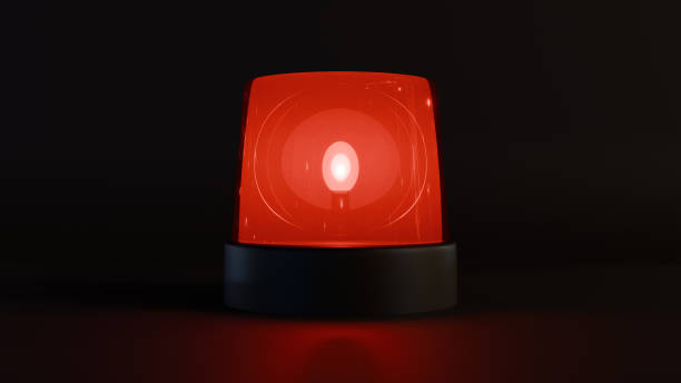 istock Red beacon light flashing intensely on a black background 2183891638