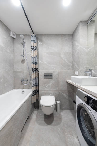 istock Bright Elegant Modern Luxury Home Bathroom Interior Design With White Sink. Mirror and Faucet. LED Lights. Shower Area, Tiled Floor and Walls 2183895151