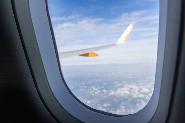 istock View from airplane window to earth 2183895218