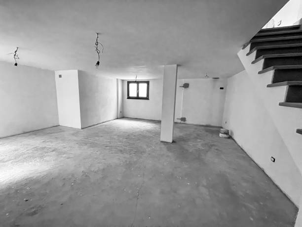 Construction Workers and Tools on Site for New House Renovation and Remodeling