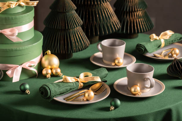 istock Stunning green table set for Christmas with baubles and decorations. 2183903577
