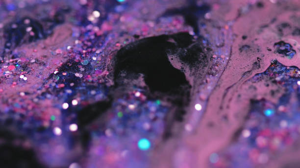 istock Glitter ink drip shiny paint mix purple pink black 2183915813