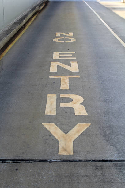 istock Yellow No Entry sign painted on a concrete asphalt bitumen road 2183919042
