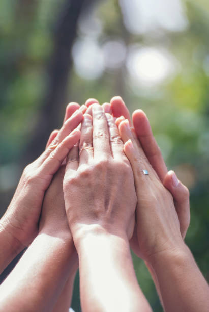 istock Vertical Horizon Group of teamwork high five team together hands raise up power partner. Diversity multiethnic business people hands success team together. Vertical Collaborate Volunteer partner win 2183919360