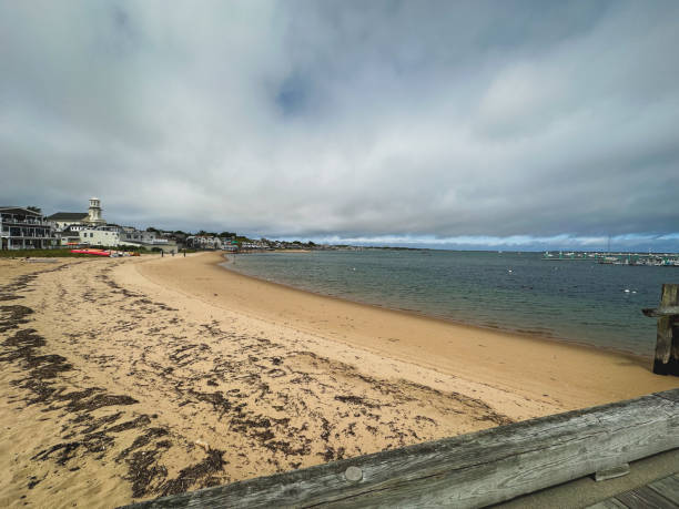 Beach cottages with terrace and pier on a summer day, Provincetown, massachusettsgay village, USA