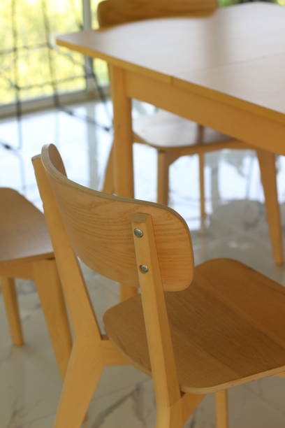 istock Tables and chairs at a coffee shop 2183929701