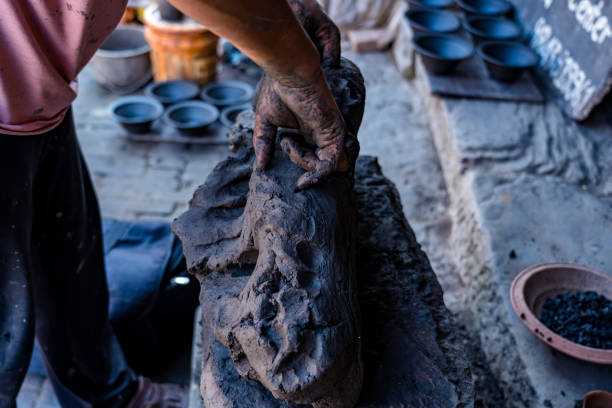 People are making clay pottery during the Tihar festival in Bhaktapur, Nepal, on Tuesday October 22, 2024.