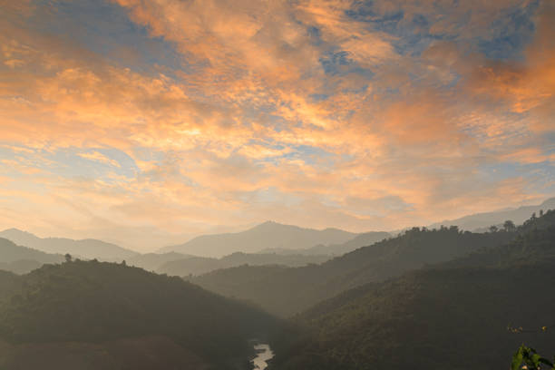 The sky with orange clouds after twilight of sunset  background