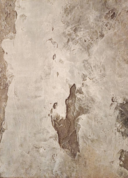 Texture of white plaster on a concrete wall handmade. Construction, interior design.