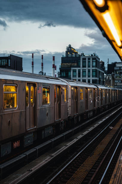 istock Elevated subway train during sunset in Queens, New York City 2183931787