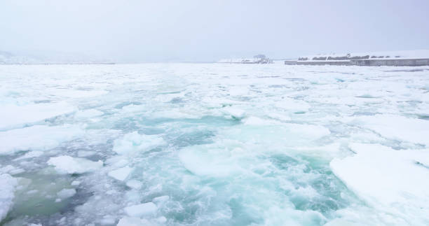 drift ice floes on the sea in hokkaido japan viewed from an icebreaker ship during winter
