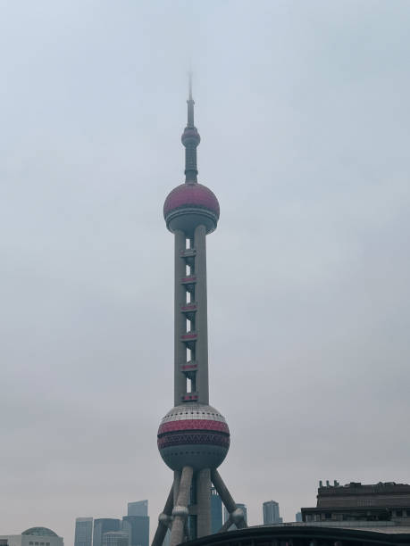 istock Shanghai Pearl Tower on a cloudy day 2183940986