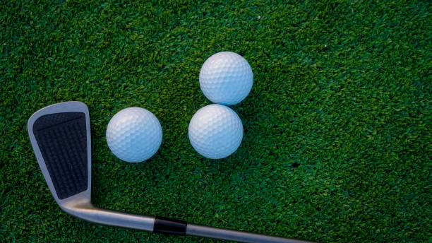 istock Close up of golf equipment on green grass. 2183945019