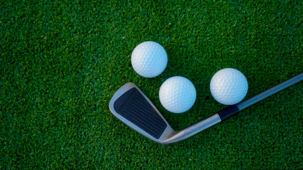 istock Close up of golf equipment on green grass. 2183945024