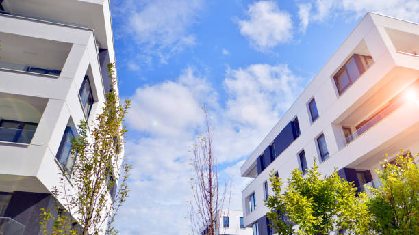 istock Eco apartment building saving energy and fresh air concept. 2183946100
