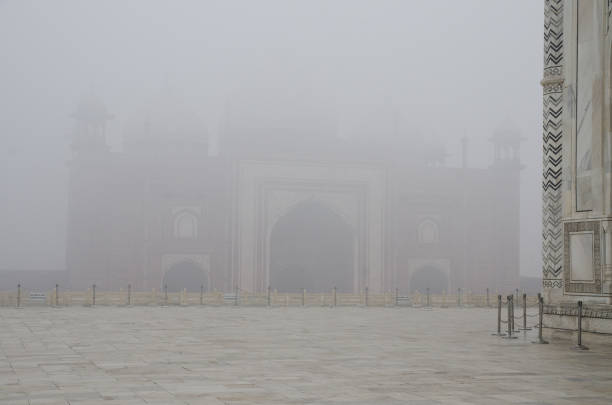 Taj Mahal Details, Agra, India. Architecture. Landscape under the fog.