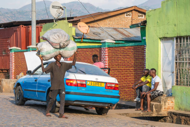 BUJUMBURA, BURUNDI - 2023/08/05: People of Africa in their natural habitat go about their daily business