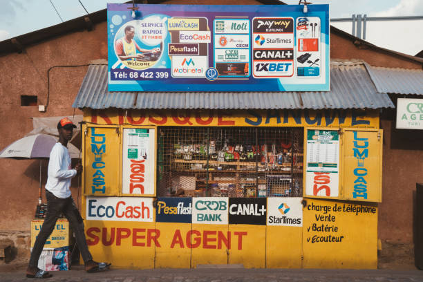 BUJUMBURA, BURUNDI - 2023/08/05: People of Africa in their natural habitat go about their daily business