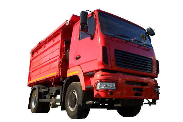 Dump track isolated. Red construction truck on empty background. Heavy construction equipment. High quality photo