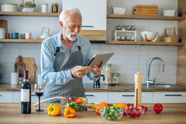 istock Senior Man using tablet to find a recipe 2183948766