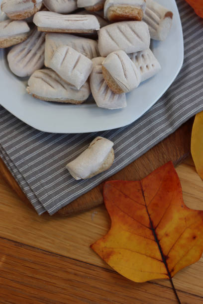 istock Sicilian traditional cookies called Ossa dei Morti on a plate on table 2183950381