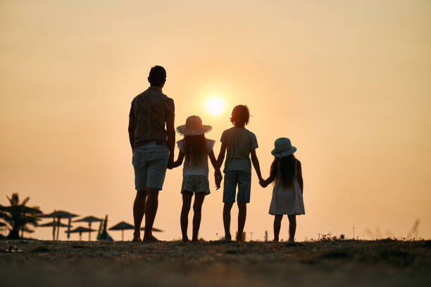 istock A family enjoying a tropical paradise beach during sunset 2183950928