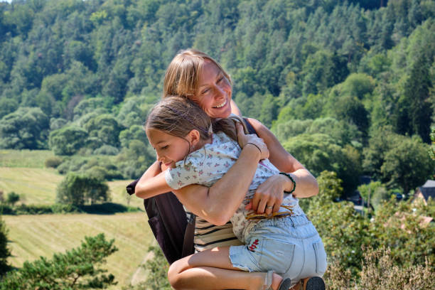 istock Mother-Daughter Embrace in Nature 2183952333