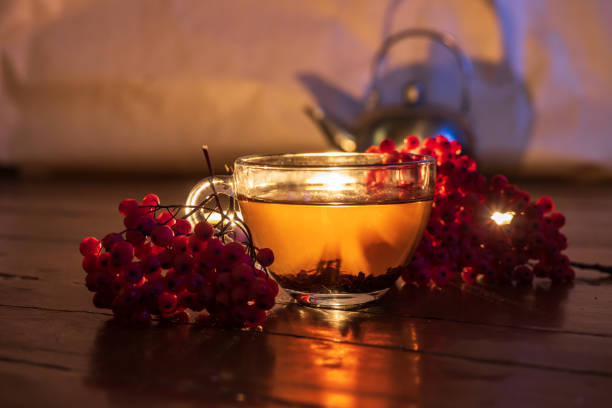 cup of tea with rowan berries