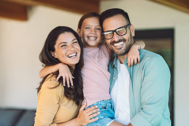 istock Happy loving mother, father and daughter 2183953080