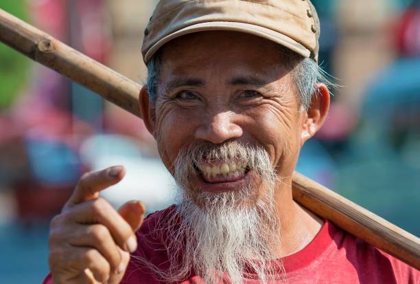 Waste Collector Photo taken in Ho Chi Minh City, Vietnam vietnamese old man portrait stock pictures, royalty-free photos & images