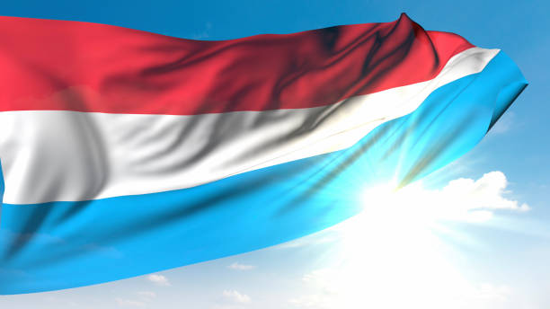 In the bright sunlight, the occasional wink of the sun behind the waving Luxembourg flag gives hope. / You can see the animation movie of this image from my iStock video portfolio. Video number: 2182701661