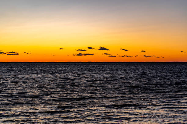 Sunset over Sinepuxent Bay within Assateague Island National Seashore in Berlin, Maryland.