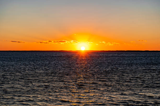 Sunset over Sinepuxent Bay within Assateague Island National Seashore in Berlin, Maryland.