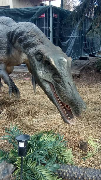 istock model of a dinosaur in a city park 2183963955
