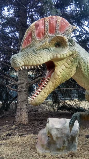 istock model of a dinosaur in a city park 2183963971