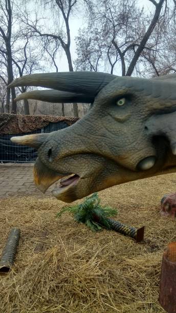 istock model of a dinosaur in a city park 2183964004
