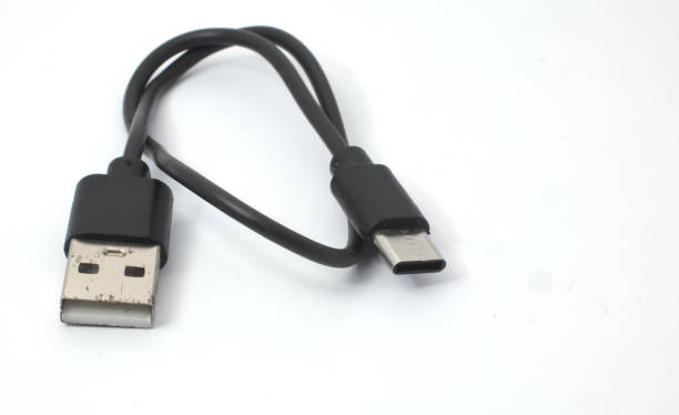 istock USB cable in a neat loop with Type-A and Type-C connectors on white background. 2183964223