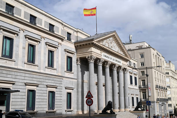 Madrid, Spain, october 6, 2024 : Congress of Deputies of the City of Madrid with two bronze lions adorning the entrance to the building