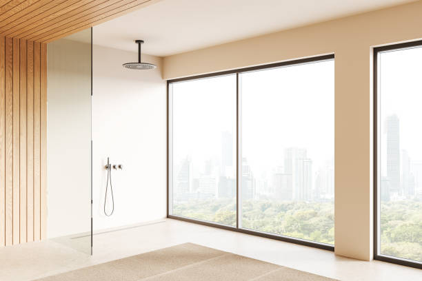 istock Cozy hotel bathroom interior with glass shower and panoramic window 2183968522