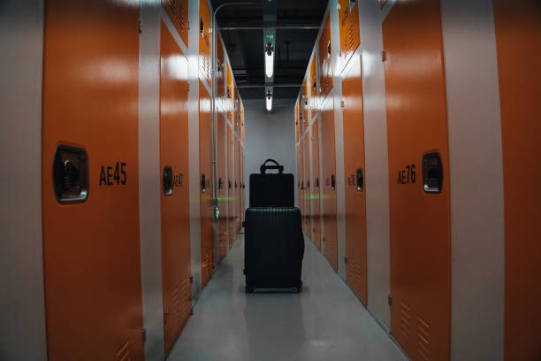 Luggage and briefcase or handbag in the hallway of a warehouse to be stored, Shanghai, China