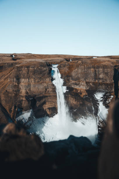 istock Bright Daylight at Haifoss: First Ice of Autumn 2183972448