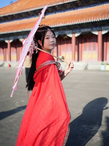 Female tourist wearing Chinese national costume