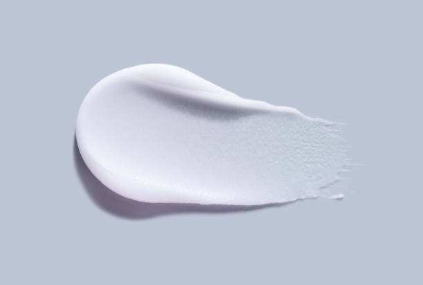 istock Cosmetic scrub peeling soda or baking powder texture swatch on blue background 2183976320