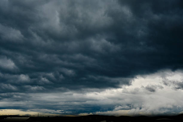 Stormy cloudy sky dramatic dangerous dark gray cloudscape.