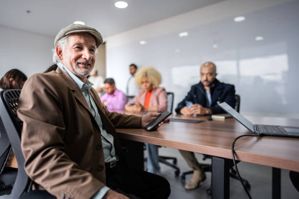 istock Portrait of a senior man working at office 2183977538