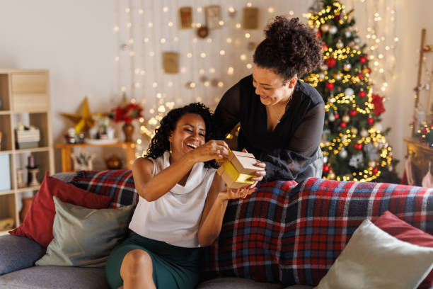 istock Surprising her girlfriend with a Christmas present 2183981935