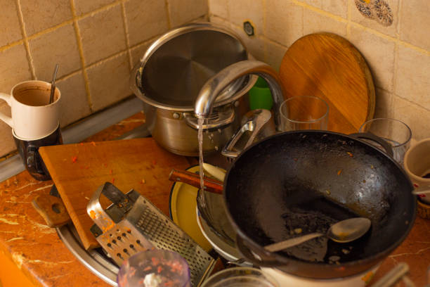 istock A mountain of dirty unwashed dishes 2183988112